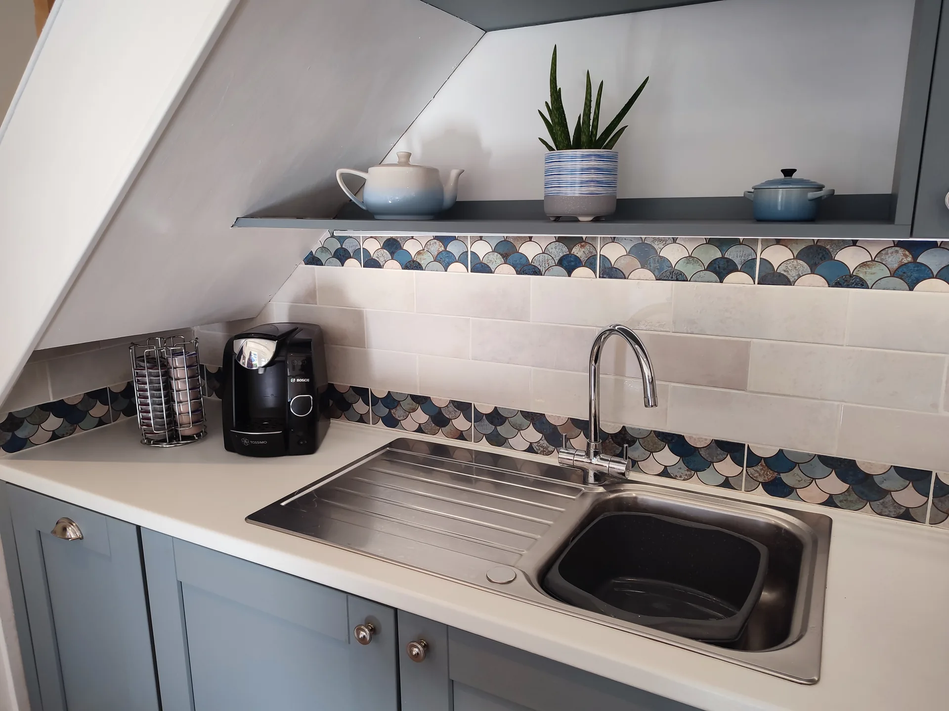 Nautical fish-scale kitchen tiles